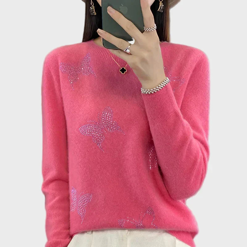 Knitted turtleneck with butterfly design