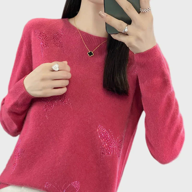 Knitted turtleneck with butterfly design