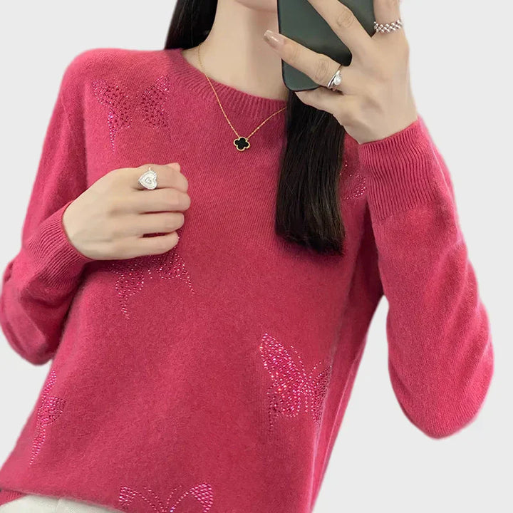 Knitted turtleneck with butterfly design