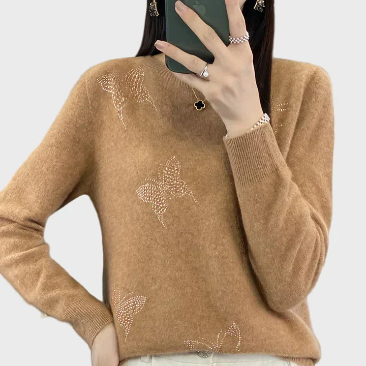 Knitted turtleneck with butterfly design