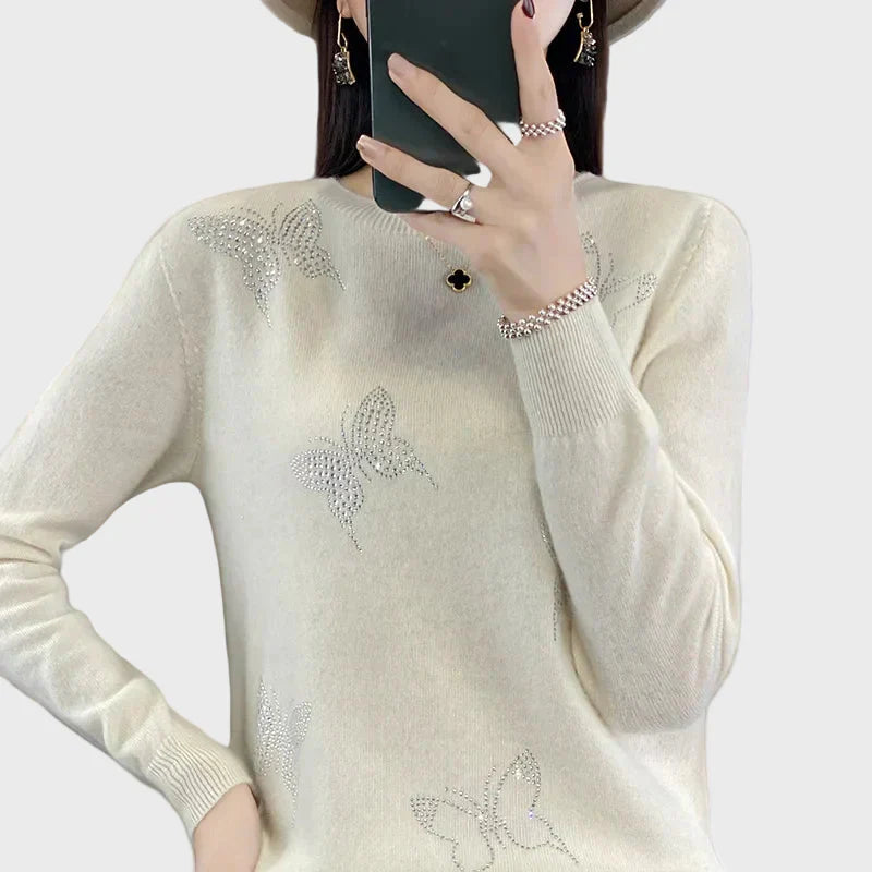 Knitted turtleneck with butterfly design