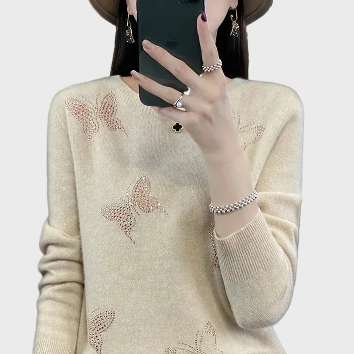 Knitted turtleneck with butterfly design