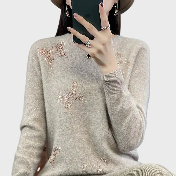 Knitted turtleneck with butterfly design