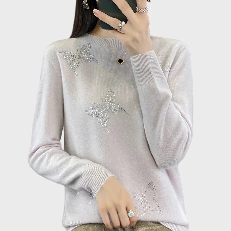 Knitted turtleneck with butterfly design