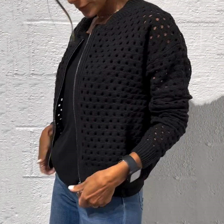 Chaqueta informal de punto con cremallera para mujer y diseño calado.